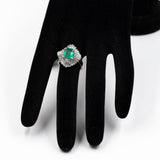 ANELLO A BALLERINA IN PLATINO 900 CON SMERALDO CENTRALE (1.80 CT) E DIAMANTI (1.05CT)