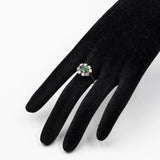 Bague vintage en or jaune 14 carats avec tourmaline verte (environ 1 ct) et diamants taille brillant (environ 0.80 ct), années 70