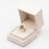 Bague vintage en or 8 carats avec rubis, saphirs et diamant.