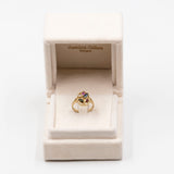 Vintage 8k gold ring with rubies, sapphires and diamond.