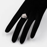ANELLO GEOMETRICO CON FIORE IN PLATINO CON DIAMANTI (1CTW), ANNI ‘80