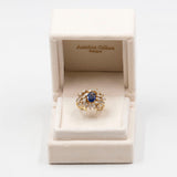 *ANZAHLUNG*Vintage-Ring aus 18 Karat Gelbgold mit zentralem Saphir (1,20 ct) und Diamanten im Navette- und Baguetteschliff (2.70 ctw), 70er Jahre