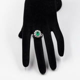 Bague marguerite vintage en or blanc 14 carats avec émeraude (1,30 ct) et diamants (0,90 ct), années 60