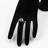 Anello vintage in oro bianco 9k con rubino stellato (1,20ct) e diamanti (0,10ctw)