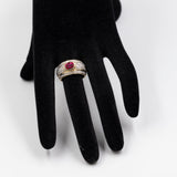 VINTAGE-BANDRING AUS 18K GELBGOLD MIT RUBIN (CA. 1.40 KT.) UND DIAMANTEN IM BRILLANTSCHLIFF (CA. 1 KT.), 70er/80er Jahre