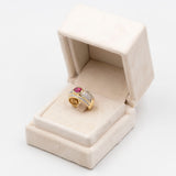 VINTAGE-BANDRING AUS 18K GELBGOLD MIT RUBIN (CA. 1.40 KT.) UND DIAMANTEN IM BRILLANTSCHLIFF (CA. 1 KT.), 70er/80er Jahre