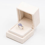 Vintage-Ring aus 9-karätigem Weißgold mit Tansaniten (1 Karat) und Diamanten, 2004