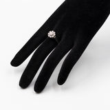 Vintage 18K white gold flower ring with brilliant cut diamonds (approx. 0.75ctw), 60s