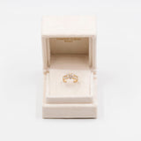 ANELLO A FASCIA IN ORO 18K CON MARGHERITA DI DIAMANTI (1CTW)