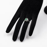 Bague vintage en or blanc 14 carats avec émeraude (environ 0.40 ct) et diamants (environ 0.06 ct au total), années 70