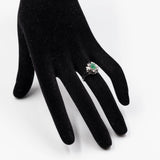 Bague vintage en or blanc 14 carats avec émeraude (environ 0.40 ct) et diamants (environ 0.06 ct au total), années 70