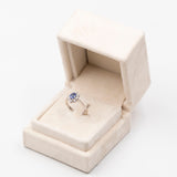 Bague vintage en or blanc 14 carats avec émeraude (environ 0.40 ct) et diamants (environ 0.06 ct au total), années 70