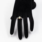 Anello in oro bianco 9k con opale e diamanti