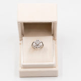 Bague fleur vintage en or blanc 14 carats avec diamant central de 0,80 ct et diamants environnants de 0,36 ct, années 70