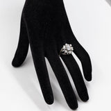 Bague fleur vintage en or blanc 14 carats avec diamant central de 0,80 ct et diamants environnants de 0,36 ct, années 70