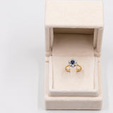 Vintage-Gänseblümchen-Ring aus 14-karätigem zweifarbigem Gold mit Saphir (0.50 ct) und Diamanten (0.65 ctw), 70er Jahre