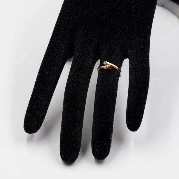 Anello contrarier in oro giallo 18k con diamante e zaffiro, anni '70
