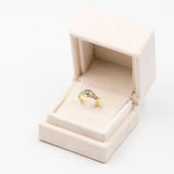 Vintage 18K yellow gold ring with emerald (0.20ct approx.) and brilliant cut diamonds, 70s