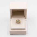 Vintage drei Ringe aus 14-karätigem Gelbgold mit Saphir, Rubin, Smaragd und Diamant (0.30 ctw), 70er Jahre