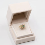 Vintage drei Ringe aus 14-karätigem Gelbgold mit Saphir, Rubin, Smaragd und Diamant (0.30 ctw), 70er Jahre