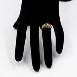 Vintage-Ring aus 18 Karat Gelbgold mit Rubin, Saphir, Smaragd und Diamant (0.30 ctw), 70er Jahre