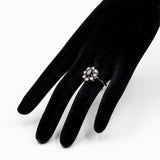 Vintage-Gänseblümchenring aus 18-karätigem Weißgold mit Saphir (1,50 ctw) und Diamanten (0.40 ctw), 60er Jahre