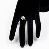 Vintage-Gänseblümchenring aus 14 Karat Weißgold mit Diamanten im Brillantschliff (insgesamt 1 Karat), 60er/70er Jahre