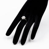 Vintage-Gänseblümchenring aus 14 Karat Weißgold mit Diamanten im Brillantschliff (insgesamt 1 Karat), 60er/70er Jahre