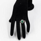 Bague marguerite vintage en or jaune et blanc 14 carats avec émeraude (environ 1.75 ct) et diamants taille brillant (environ 0.72 ct), années 70