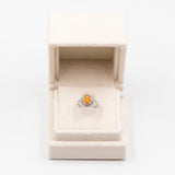 Anello vintage a ballerina in platino 900 con opale di fuoco (1,53ct) e diamanti (0,51ctw)