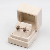 Orecchini vintage in oro giallo 14k con rubini e diamanti