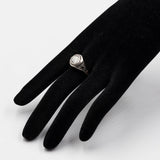 Anello antico in oro giallo 11K e argento con diamante centrale (1.50ct ca.) e rosette, primi del '900