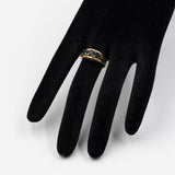 Anello trilogy vintage in oro giallo 8k con spinelli sintetici verdi