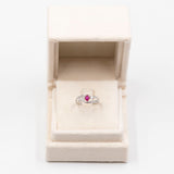 Anello vintage in platino con rubino a goccia (0.37ct) e diamanti (0,43ctw)