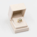 Bague vintage en or jaune 14 carats avec saphir, rubis, émeraude et diamants. Années 70