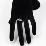 Anello vintage in oro bianco 9k con tanzanite (0,80ct) e diamanti (0,10ctw)