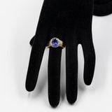 Vintage Gänseblümchenring aus 14-karätigem Gelbgold mit Tansanit (2.70 ct) und Diamanten (0.40 ctw)