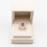 Vintage Gänseblümchenring aus 14-karätigem Gelbgold mit Tansanit (2.70 ct) und Diamanten (0.40 ctw)
