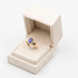 Vintage Gänseblümchenring aus 14-karätigem Gelbgold mit Tansanit (2.70 ct) und Diamanten (0.40 ctw)