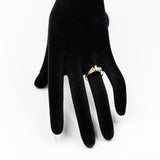 Vintage-Ring aus 14-karätigem Gelbgold mit zentralem Diamanten im Marquise-Schliff (ca. 0.25 ct) und seitlichen Diamanten im konischen Schliff, 70er/80er Jahre