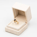 Vintage-Ring aus 14-karätigem Gelbgold mit Saphir (0.70 ct) und Diamanten (0.15 ct), 70er Jahre