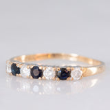 Bague vintage en or jaune 9 carats avec saphirs (environ 0.18 ct au total) et diamants taille brillant (environ 0.16 ct au total), année 1987