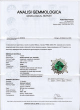 ANELLO A MARGHERITA IN PLATINO CON SMERALDO NATURALE (0.93CT) E DIAMANTI (0.72CT), ANNI ‘80/‘90