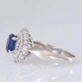 Anello a margherita vintage in platino con zaffiro (1.01ct) e diamanti (0.30ctw), anni ‘80/‘90