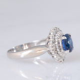 Anello a margherita vintage in platino con zaffiro (1.01ct) e diamanti (0.30ctw), anni ‘80/‘90