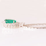 18K white gold necklace with emerald (approx. 1.20ct) and brilliant cut diamonds (approx. 0.58ctw)