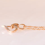 Vintage-Halskette mit Kette aus 9-karätigem Roségold und Herzanhänger aus 9-karätigem Roségold mit Diamanten