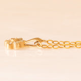 Vintage-Halskette aus 9-karätigem Gelbgold mit Blumenanhänger aus 9-karätigem Gelbgold und Diamanten (ca. 0.07 ctw)