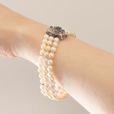 Vintage-Armband aus 18 Karat Weißgold mit weißen Perlen und Saphiren, 50er Jahre