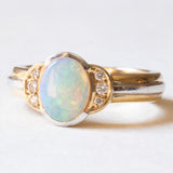 Vintage-Ring aus 18-karätigem Gelb- und Weißgold mit Opal (ca. 0.90 ct) und Diamanten im Brillantschliff (ca. 0.06 ctw), 70er Jahre